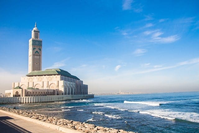 The majestic Hassan II Mosque in Casablanca, Morocco, with its intricate architecture and oceanfront location