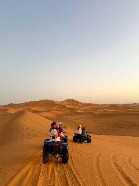 Our special guests enjoying a quad biking adventure in Merzouga desert