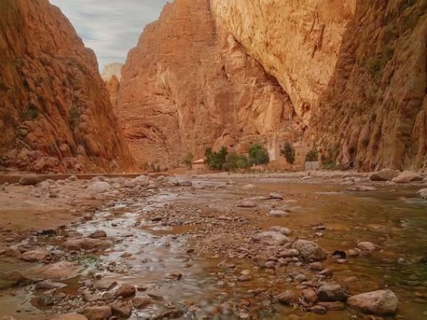 Travelers exploring the impressive Todra Gorge in Morocco