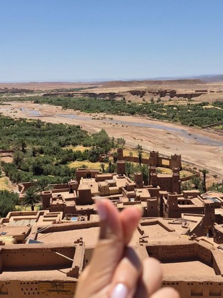 Ait Ben Haddou ancient ksar surrounded by desert landscapes during a 7-day Morocco itinerary