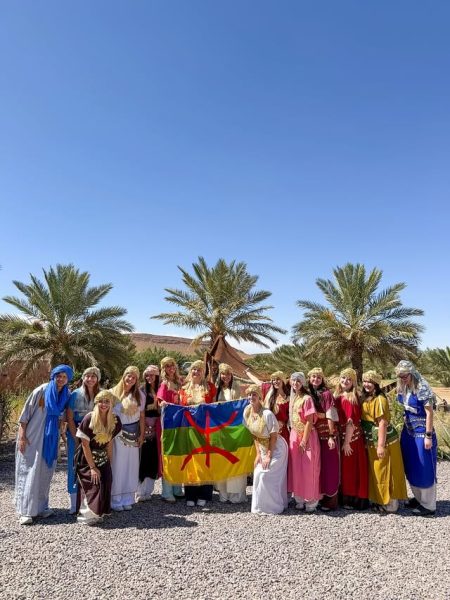 Travelers enjoying a scenic stop along the road during a 7-day Morocco itinerary