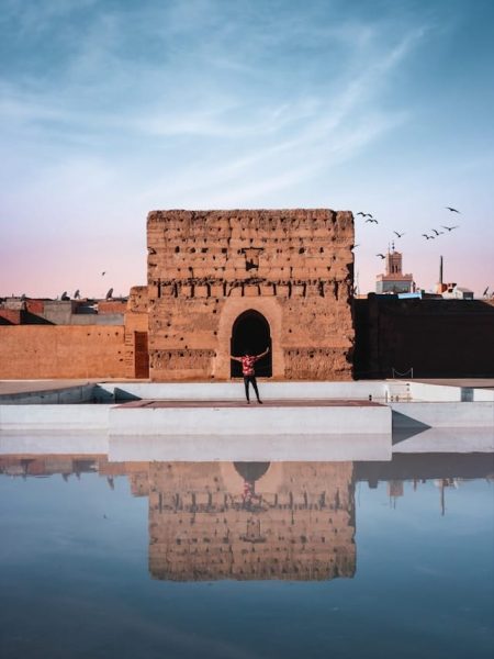 The historic ruins and reflecting pools of El Badi Palace on a 10 day Morocco trip itinerary.